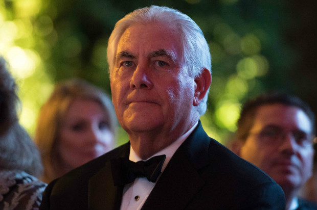 Former ExxonMobil executive Rex Tillerson, US President-elect Donald Trump's pick for US Secretary off State, attends the Chairman's Global Dinner a black-tie, invitation-only dinner aimed at introducing foreign diplomats to the team tasked with implementing the "America First" policies of the next administration, in Washington, DC on January 17, 2017. / AFP PHOTO / JIM WATSON ORG XMIT: JIM021