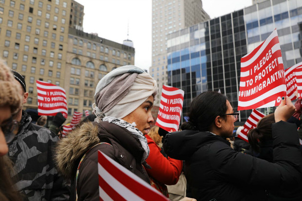 NEW YORK, NY - JANUARY 27: Area Muslims and local immigration activists participate in a prayer and rally against President Donald Trump's immigration policies on January 27, 2017 in New York City. President Trump has taken actions since the inauguration to start the building of a long promised wall along the Mexican border and to cut federal grants for immigrant protecting 'sanctuary cities'. Spencer Platt/Getty Images/AFP == FOR NEWSPAPERS, INTERNET, TELCOS & TELEVISION USE ONLY ==