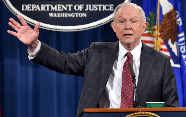 US Attorney General Jeff Sessions speaks during a press conference at the US Justice Department on March 2, 2017, in Washington DC. Sessions announced Thursday that he would recuse himself from any investigations into President Donald Trump's 2016 election campaign. But after receiving a strong endorsement from Trump, Sessions did not bow to pressure to step down over charges he lied to Congress about his contacts with the Russian ambassador before the election. / AFP PHOTO / Nicholas Kamm