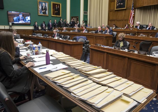 Folders containing amendments to the GOP's "Obamacare" replacement bill are spread on a conference table on Capitol Hill in Washington, Thursday, March 9, 2017, as members of the House Energy and Commerce Committee worked through the night. (AP Photo/J. Scott Applewhite) ORG XMIT: DCSA107
