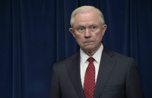 FILE - In this March 6, 2017 file photo, Attorney General Jeff Sessions waits to make a statement at the U.S. Customs and Border Protection office in Washington. Sessions is seeking the resignations of 46 United States attorneys who were appointed during the prior presidential administration, the Justice Department said Friday, March 10, 2017. (AP Photo/Susan Walsh, File) ORG XMIT: WX106
