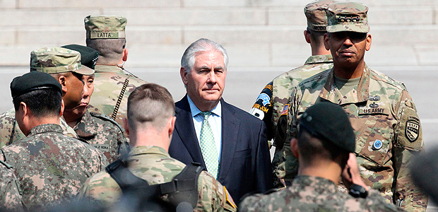 US Secretary of State Rex Tillerson (C) walks with US Gen. Vincent K. Brooks, commander of the United Nations Command, Combined Forces Command and United States Forces Korea (R) during a visit at the border village of Panmunjom, which has separated the two Koreas since the Korean War, on March 17, 2017. Washington's top diplomat visited the Demilitarised Zone dividing the two Koreas to gaze on the North for himself on March 17, a day after he declared 20 years of efforts to denuclearise it had failed. / AFP PHOTO / POOL / Lee Jin-man ORG XMIT: LJM103