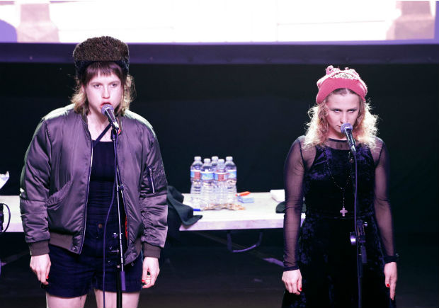 Nastya (L) and Maria Alyokhina of Russian Band Pussy Riot perform onstage at the Fonda Theater on March 12, 2017, in Hollywood, California. Russian punk provocateurs Pussy Riot are branching into theater to tell their story in a performance entitled "Spring Revolution" which explores women's empowerment. / AFP PHOTO / VALERIE MACON ORG XMIT: 01