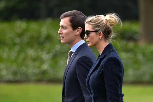 Senior Advisor to the President, Jared Kushner (L), walks with his wife Ivanka Trump to board Marine One at the White House in Washington, DC, on March 3, 2017. The two are travelling with US President Donald Trump to Florida. / AFP PHOTO / MANDEL NGAN ORG XMIT: MNN009