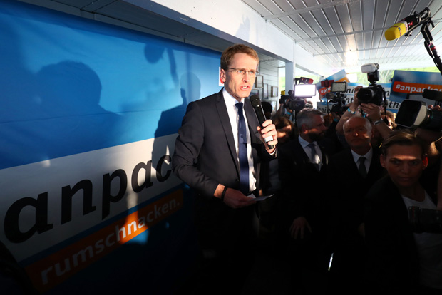 Daniel Guenther, candidate of the Conservative Christian Democrats (CDU) party for the Schleswig-Holstein state election speaks after the first election polls on Schleswig-Holstein state elections in Kiel, northern Germany, on May 7, 2017. Voters in Germany's northernmost state Schleswig-Holstein go to the polls, in a regional election to be scrutinised for clues on whether left-wingers can unseat conservative Chancellor Angela Merkel in September. / AFP PHOTO / dpa / Christian Charisius / Germany OUT ORG XMIT: 90-016230