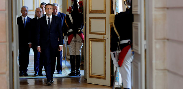 French President-elect Emmanuel Macron walks during the handover ceremony at the Elysee Palace in Paris, France, May 14, 2017. REUTERS/Philippe Wojazer ORG XMIT: PHW15