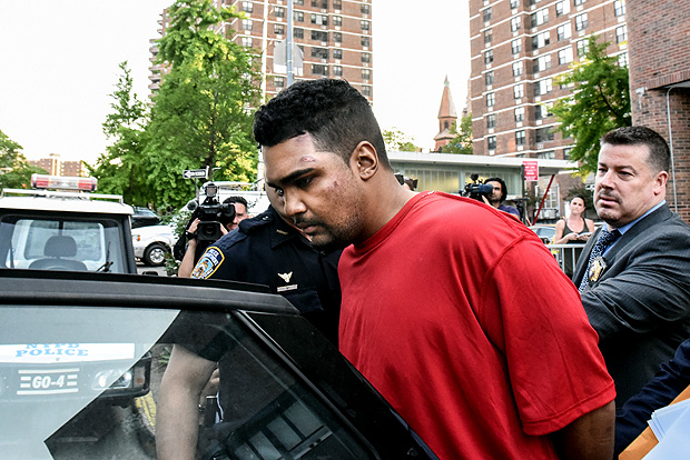 Richard Rojas is escorted from the 7th precinct by New York City Police officers after being processed in connection with the speeding vehicle that struck pedestrians on a sidewalk in Times Square in New York City, U.S. May 18, 2017. REUTERS/Stephanie Keith TPX IMAGES OF THE DAY ORG XMIT: NYK801
