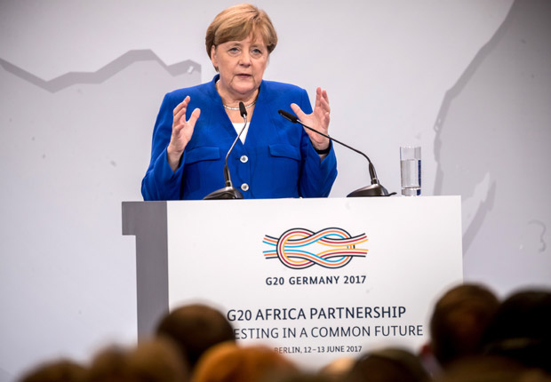 German Chancellor Angela Merkel speaks at the G20 Africa partnership conference in Berlin on June 12, 2017. / AFP PHOTO / dpa / Michael Kappeler / Germany OUT ORG XMIT: 90-019928