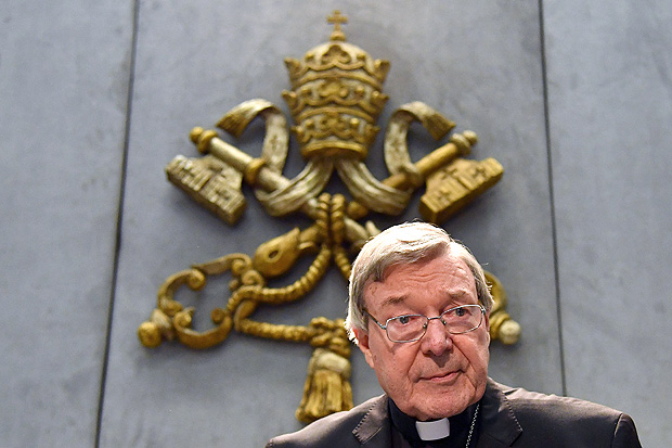 Australian Cardinal George Pell looks on as he makes a statement at the Holy See Press Office, Vatican city on June 29, 2017 after being charged with historical child sex offences in a case that has rocked the church. Cardinal George Pell said on June 29 that he would take leave from the Vatican to return to Australia to fight sexual assault charges after being given strong backing from Pope Francis, who has not asked him to resign from his senior Church post. / AFP PHOTO / Alberto PIZZOLI ORG XMIT: APZ100