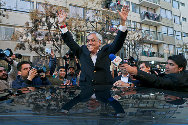 Sebastian Pinera, Chile's former president who's a candidate in the presidential primary election with the conservative coalition of parties called "Chile Vamos," or "Chile Let's Go," waves after voting in his party's primary election in Santiago, Chile, Sunday, July 2, 2017. Chile will hold its presidential election in November. (AP Photo/Esteban Felix) ORG XMIT: EFX101