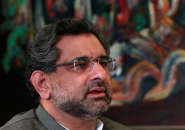 FILE PHOTO: Pakistan's Petroleum and Natural Resources Shahid Khaqan Abbasi speaks during an interview with Reuters at his office in Islamabad November 8, 2013.REUTERS/Mian Kursheed/File Photo ORG XMIT: MKZ103