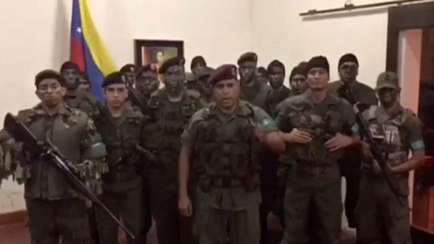 A still image from video released by Operation David Carabobo purportedly shows a group of men dressed in military uniforms announcing uprising in Valencia, Venezuela August 6, 2017. Operation David Carabobo/Handout via REUTERS ATTENTION EDITORS - THIS IMAGE HAS BEEN SUPPLIED BY A THIRD PARTY. NO RESALES. NO ARCHIVES ORG XMIT: GDY10