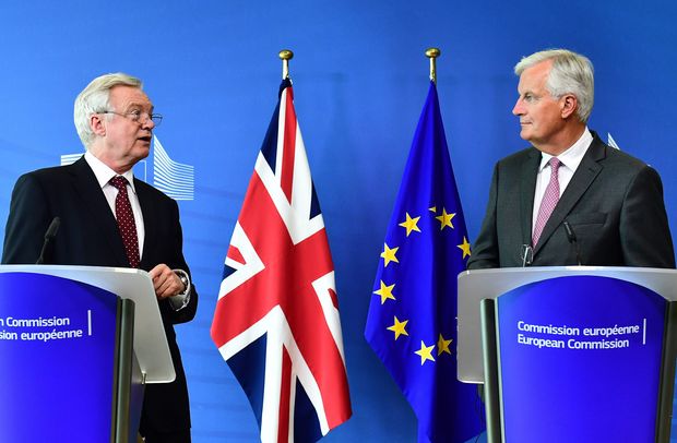 British Secretary of State for Exiting the European Union (Brexit Minister) David Davis (L) and European Union Chief Negotiator in charge of Brexit negotiations with Britain Michel Barnier (R) address media representatives at the European Union Commission Headquarters in Brussels on August 28, 2017. EU Brexit negotiator Michel Barnier today warned Britain to start "negotiating seriously" as London and Brussels kicked off a third round of tense Brexit talks
