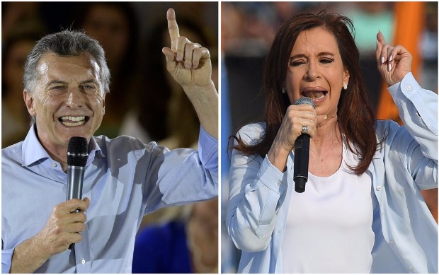 Photo composition showing file pictures of Argentine President Mauricio Macri(L) delivering a speech in support of Cambiemos party legislator candidates in Buenos Aires on October 17, 2017 and Argentina's former President and Buenos Aires senatorial candidate for the Unidad Ciudadana Party, Cristina Fernandez de Kirchner delivering a speech at Juan Domingo Peron stadium in Avellaneda, Buenos Aires on October 16, 2017. Argentine President Mauricio Macri's minority government faces a mid-term electoral test Sunday which is likely to confirm the political comeback of ex-president Cristina Kirchner, who is set to win a Senate seat. / AFP PHOTO / Juan MABROMATA AND Eitan ABRAMOVICH