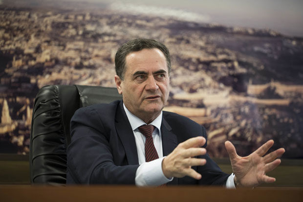 In this March 7, 2017 file photo, Israel's transportation and intelligence minister Yisrael Katz speaks during an interview with The Associated Press, in his office in Tel Aviv, Israel. Katz told The AP on Thursday, Nov. 9, 2017, that following the surprising resignation of Lebanon's prime minister, Israel is planning a diplomatic offensive against Iran and its Lebanese proxy Hezbollah at the United Nations. (AP Photo/Dan Balilty, File) ORG XMIT: DV501