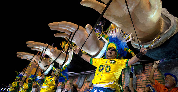 Revellers of the Paraiso do Tuiuti samba school perform during the first night of Rio's Carnival at the Sambadrome in Rio de Janeiro