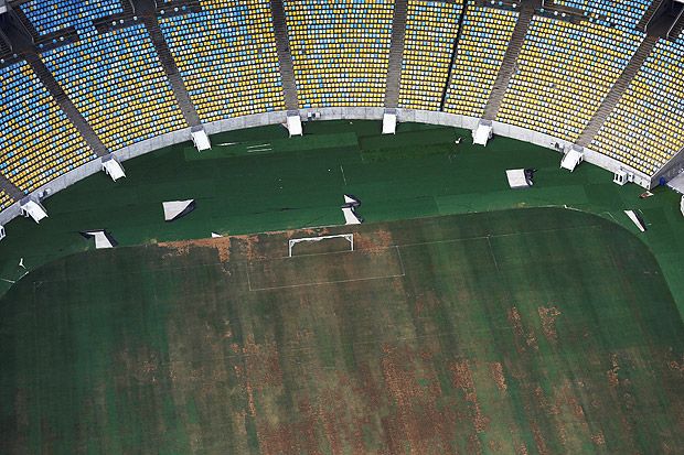 Abandoned by Odebrecht, the stadium's playing field is virtually destroyed