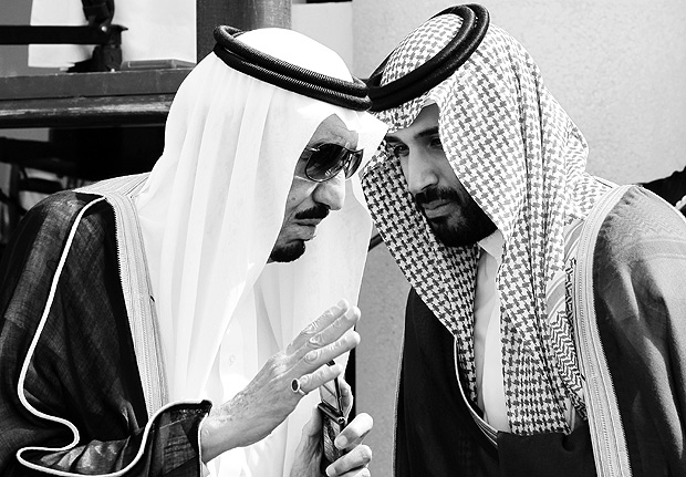 FILE - In this May 14, 2012 file photo, King Salman, left, speaks with his son, now Crown Prince Mohammed Bin Salman, (MBS), as they wait for Gulf Arab leaders ahead of the opening of Gulf Cooperation Council, in Riyadh, Saudi Arabia. The surprise dismissal and arrest of dozens of ministers, royals, officials and senior military officers by MBS late Saturday, Nov. 4, 2017, is unprecedented in the secretive, 85-year-old kingdom. But so is the by-now virtually certain rise to the throne of a 30-something royal who, in another first, is succeeding his father. (AP Photo/Hassan Ammar, File) ORG XMIT: SAUTH102