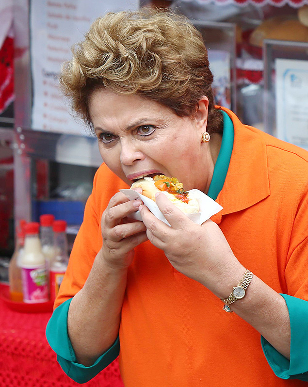 Durante visita a Osasco (Grande So Paulo), Dilma para para comer hot-dog