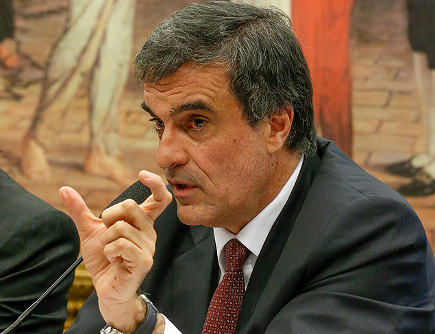 O ministro da Justia, Jos Eduardo Cardozo, alvo do PMDB, diante de quadro de Tiradentes