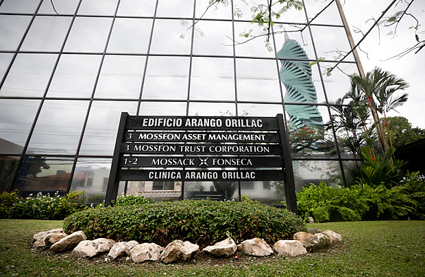 A marquee of the Arango Orillac Building lists the Mossack Fonseca law firm in Panama City, Thursday, April 7, 2016. Earlier on Wednesday the Panamanian based law firm filed a complaint with Panamanian prosecutors, alleging that the 11.5 million documents revealed in the leak were stolen by a hacking attack from somewhere in Europe. (AP Photo/Arnulfo Franco) ORG XMIT: PAN107