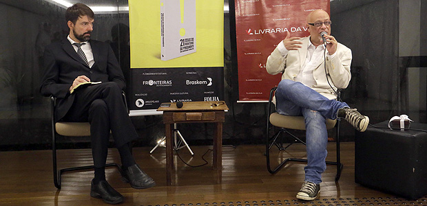 Os colunistas Folha Fernando Schler ( esq.) e Luiz Felipe Pond em debate em So Paulo 