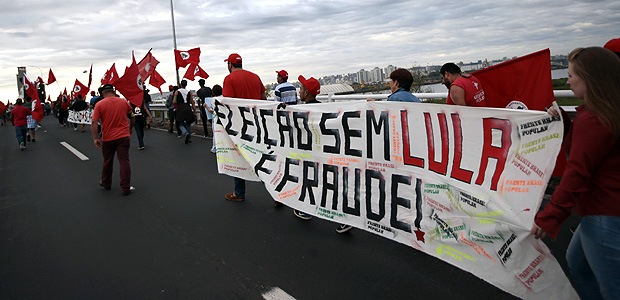 Protesters march in Porto Alegre in defence of democracy and the right of former president Lula da Silva to be a candidate in the next national elections