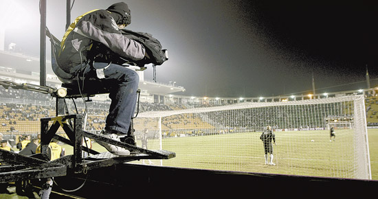 Operador de câmera em jogo do Corinthians, no Pacaembu