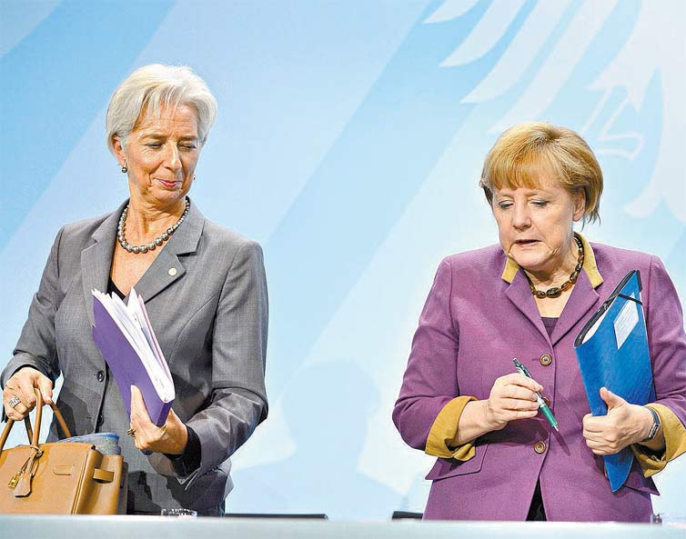 Lagarde,  esquerda, e Merkel,  direita, chanceler da Alemanha, um dos pases credores da Grcia