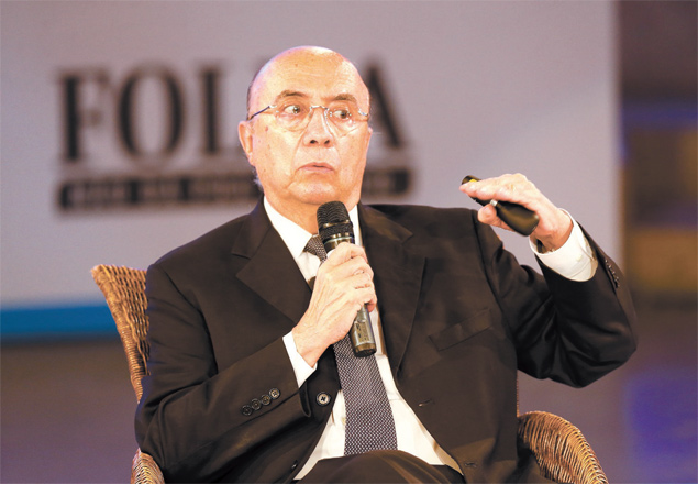 O ex-presidente do BC Henrique Meirelles apresentafrum da Folha