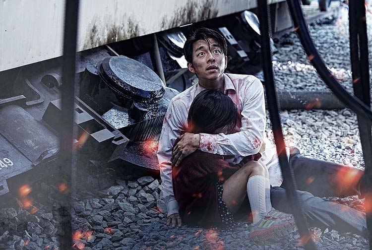 O ator Yoo Gong, com a menina Soo-an Kim, em cena de Invaso Zumbi, filme sul-coreano do diretor Sang-ho Yeon. Foto: Divulgao ***DIREITOS RESERVADOS. NO PUBLICAR SEM AUTORIZAO DO DETENTOR DOS DIREITOS AUTORAIS E DE IMAGEM***