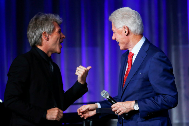 REFILE - CORRECTING TYPO IN SINGER'S NAME Former U.S. President Bill Clinton (R) and singer Jon Bon Jovi attend the Clinton Global Citizen Award in New York, U.S., September 19, 2016. REUTERS/Eduardo Munoz ORG XMIT: EMZ528