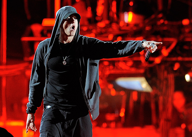 FILE - In this April 15, 2012 file photo Eminem performs at the 2012 Coachella Valley Music and Arts Festival in Indio, Calif. Eminem gave his estranged mom quite the Mother's Day gift, releasing a music video for an apologetic song that depicts her struggles raising the rebellious rapper. The Detroit rapper released the video for 