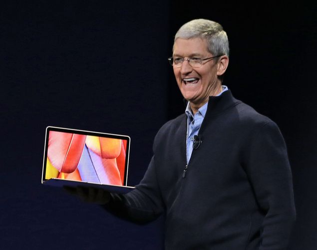 Apple CEO Tim Cook introduces the new Apple MacBook during an Apple event on Monday, March 9, 2015, in San Francisco. (AP Photo/) ORG XMIT: FX120
