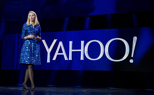 FILE - In this Jan. 7, 2014 file photo, Yahoo President and CEO Marissa Mayer speaks during the International Consumer Electronics Show in Las Vegas. Yahoo Inc. on Tuesday, April 21, 2015, reported first-quarter net income of $21.2 million. On a per-share basis, the Sunnyvale, California-based company said it had net income of 2 cents.(AP Photo/Julie Jacobson, File) ORG XMIT: NYBZ206