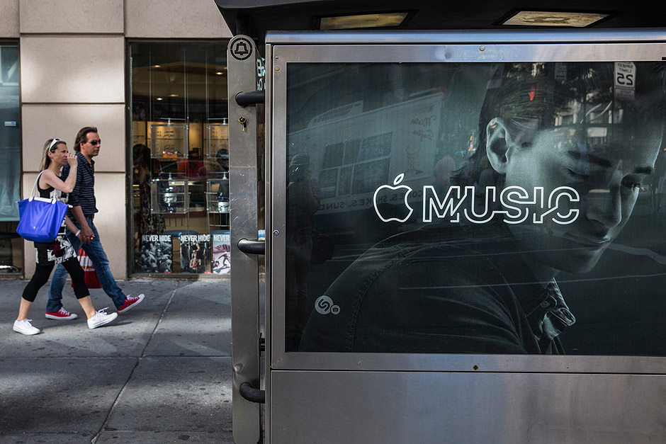 NEW YORK, NY - AUGUST 07: An advertisement for Apple Music is posted on the streets of Manhattan on August 7, 2015 in New York City. After launching in June Apple announced it has attracted 11 million users during its trial period. Andrew Burton/Getty Images/AFP == FOR NEWSPAPERS, INTERNET, TELCOS & TELEVISION USE ONLY ==
