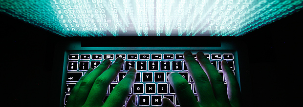 A man types on a computer keyboard in Warsaw in this February 28, 2013 illustration file picture. A barrage of damaging cyberattacks is shaking up the security industry, with some businesses and organisations no longer assuming they can keep hackers at bay, and instead turning to waging a guerrilla war from within their networks. Picture taken February 28, 2013. REUTERS/Kacper Pempel/Files (POLAND - Tags: BUSINESS SCIENCE TECHNOLOGY) ORG XMIT: FIL12