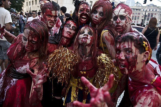 People take part in the Zombie Walk for the Day of the Dead 