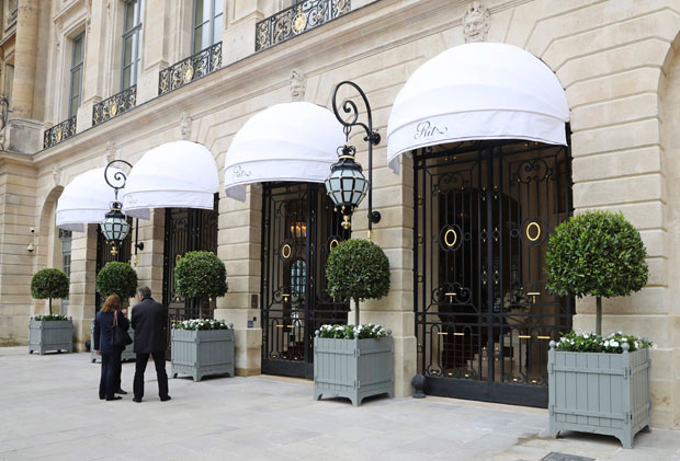 This photo taken on June 6, 2016 at the Place Vendome in Paris shows the entrance to the Ritz Paris hotel, reopened after renovations beginning in 2012. / AFP PHOTO / Jacques DEMARTHON