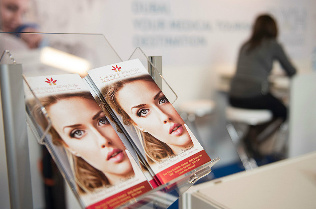 (FILES) This file photo taken on March 08, 2017 shows information material for plastic surgery displayed at a section for medical tourism at the International Tourism Trade Fair (ITB) on March 8, 2017. Medical tourism has grown into a healthy travel sector as people shop beyond their borders for everything from dental work to plastic surgery, say experts at Berlin's ITB travel fair. / AFP PHOTO / STEFFI LOOS / TO GO WITH AFP STORY BY MARIE JULIEN