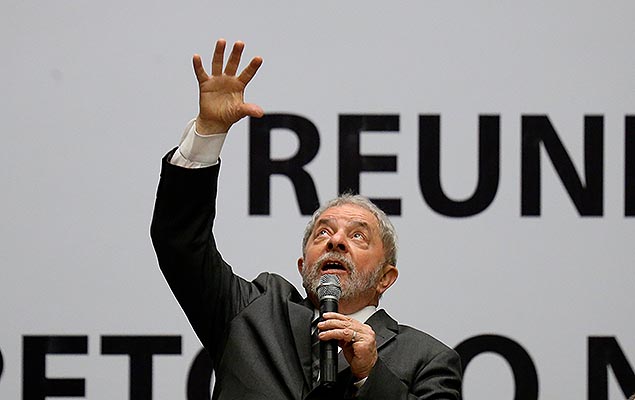 Brazil's former president Luiz Inacio Lula da Silva speaks during a meeting with members of his Workers' Party 