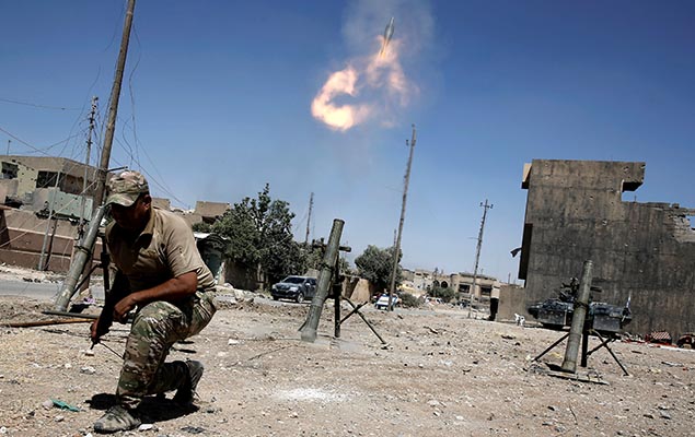 Foras iraquianas disparam sobre posies do Estado Islmico no oeste de Mossul, no Iraque