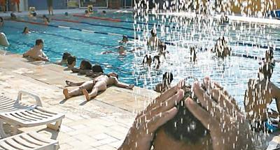 Em dia em que a temperatura atingiu 40C, banhistas se refrescam em piscina do Sesc