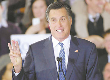 O pr-candidato republicano Mitt Romney discursa para simpatizantes em Boston aps vencer em trs primrias
