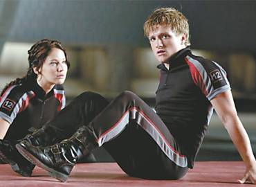 Os atores Jennifer Lawrence e Josh Hutcherson protagonizam "Jogos Vorazes"