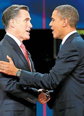Obama e Romney se cumprimentam antes de debate