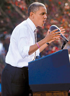 Usando pulseira rosa, Barack Obama faz discurso de campanha  reeleio em Richmond
