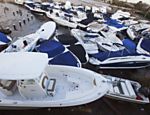 Barcos são vistos após passagem da tempestade Sandy em uma marina em East Quogue, Nova York, nos Estados Unidos Leia mais