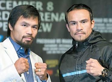 Os boxeadores Manny Pacquiao, filipino, e Juan Manuel Marquez, mexicano, que se enfrentam pela 4 vez em Las Vegas
