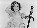 Em foto de 1933, Shirley Temple mostra seus característicos cachinhos no filme 'Dada em Penhor'